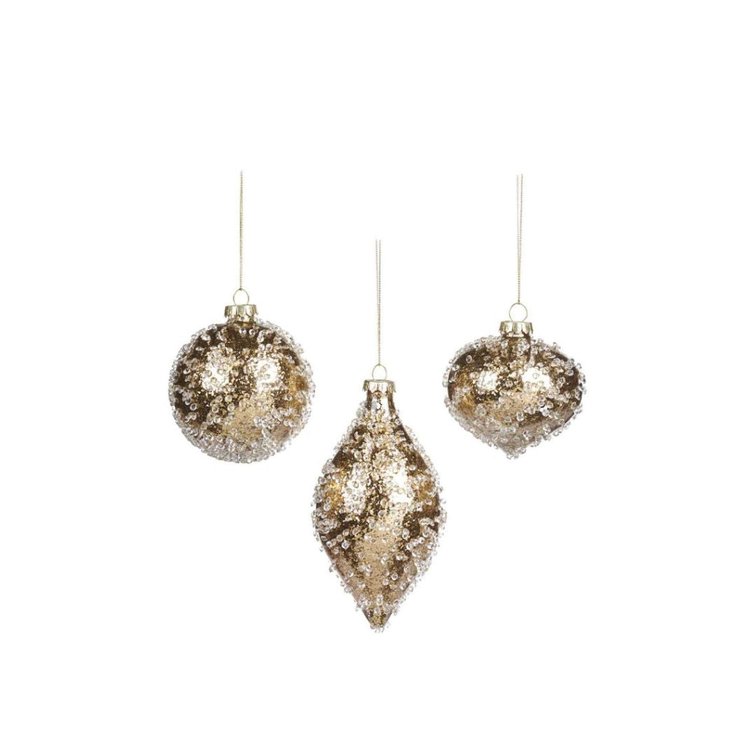 Gouden kerstballen en pegels met juwelen - Deuxamis